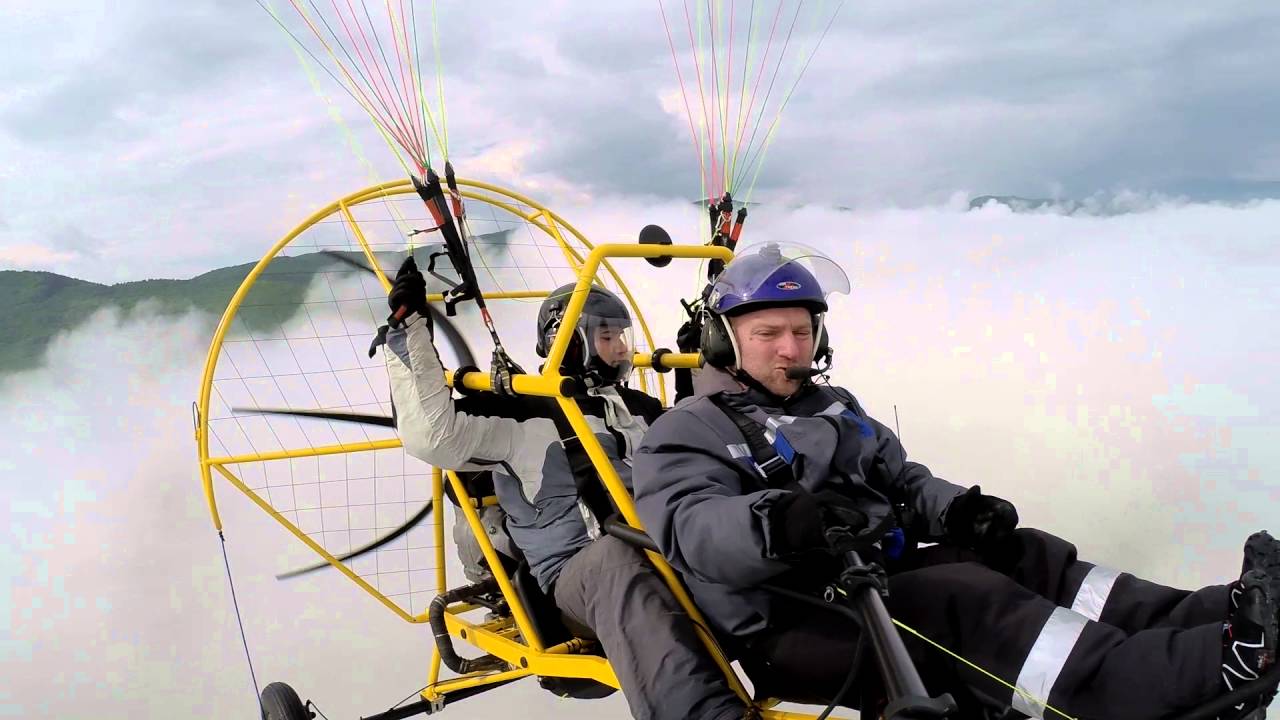 paratrike honda morning flight above the fog