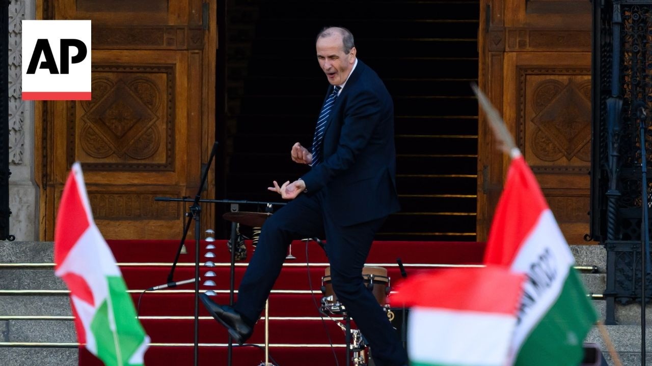 Hungary's next health minister dances outside parliament at Magyar's inauguration