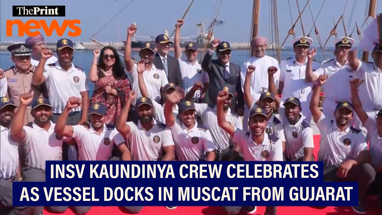 INSV Kaundinya crew celebrates as the vessel docks in Muscat from Gujarat's Porbandar.
