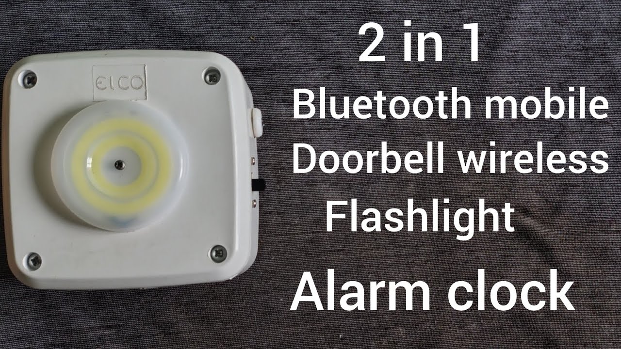 #47... 2 in 1 Bluetooth mobile with doorbell wireless alarm clock flashlight and vibrant motor...