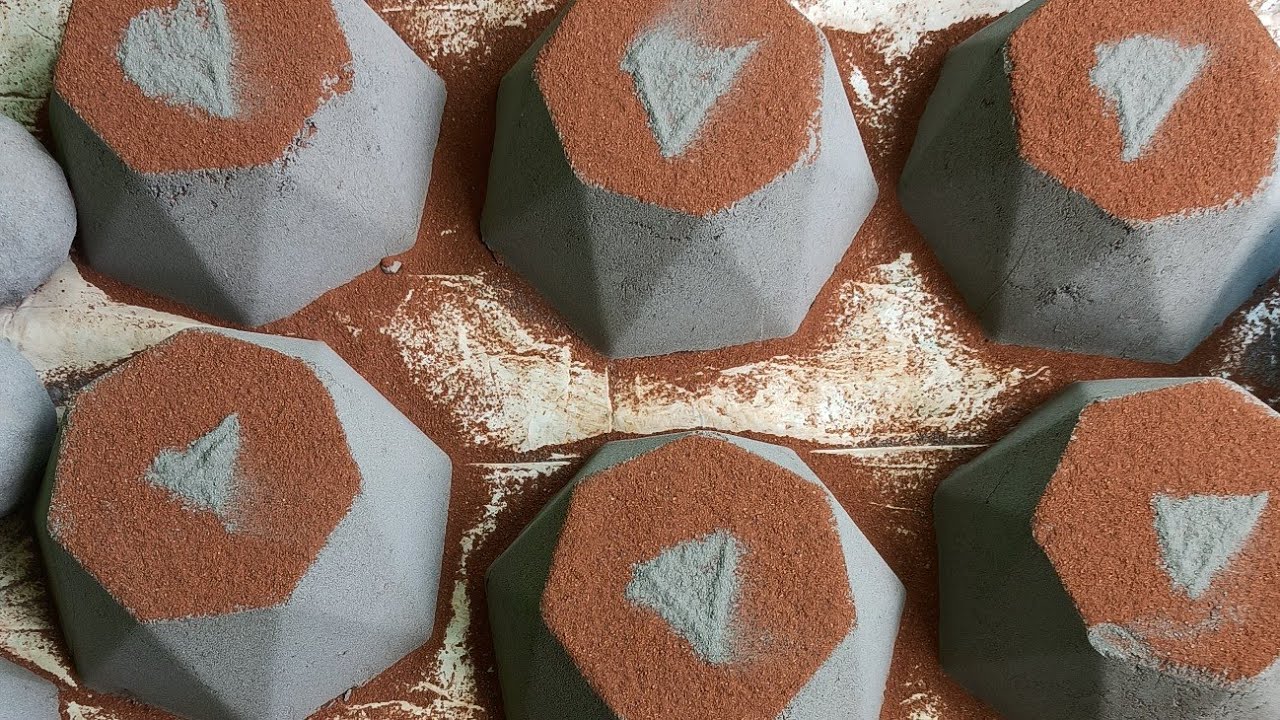 YouTube  studio logo pure cement topped red dirt dusty crumbling in water paste play and mixing