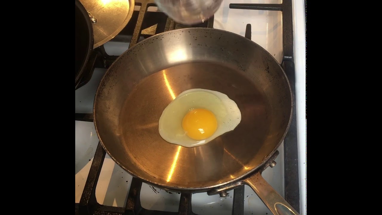 Fried egg with no oil on an All-Clad stainless steel French skillet