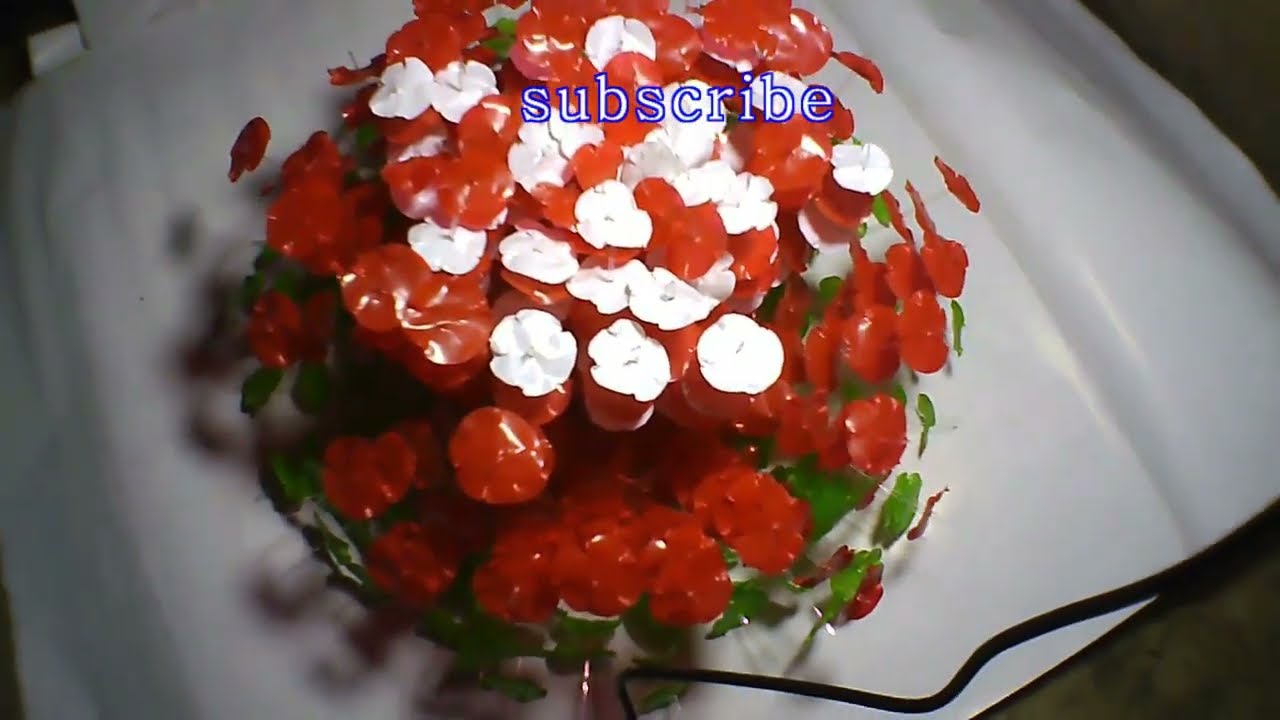 How to turn an Empty soda bottle into a flower basket