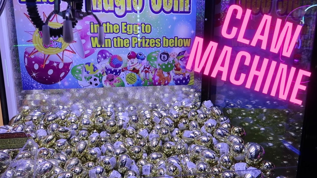 Playing the Golden Egg Claw Machine at the Arcade - What's Inside the Eggs?