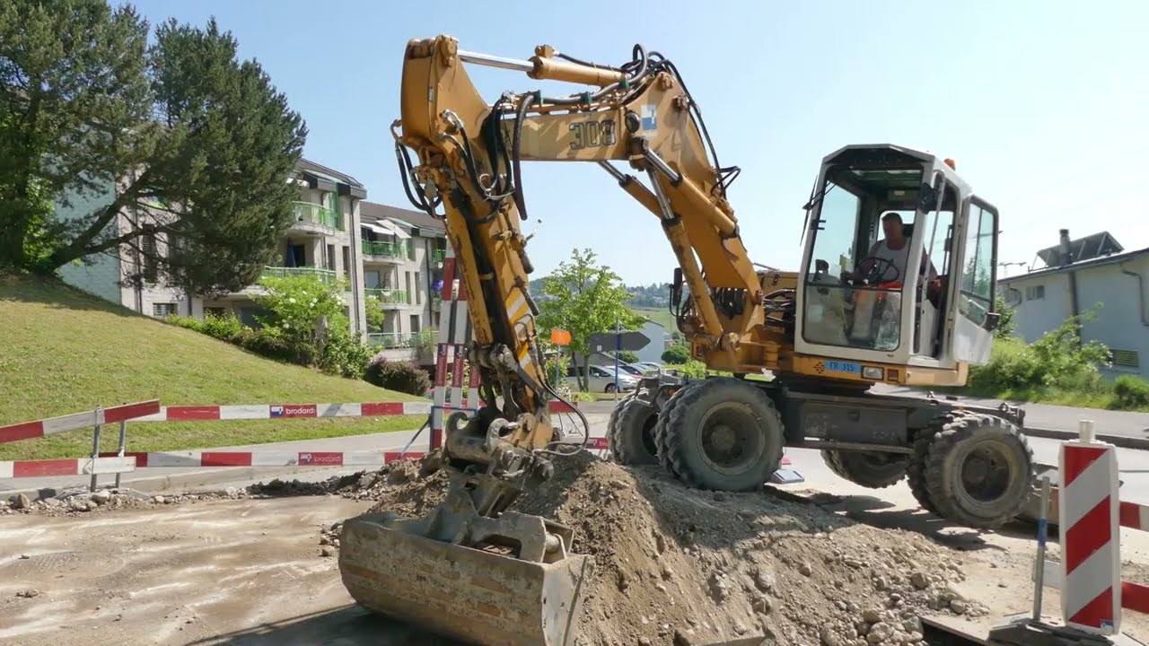 Chantier Excavatrices, pelleteuses, Tractopelle, Matran Route de l'Arney