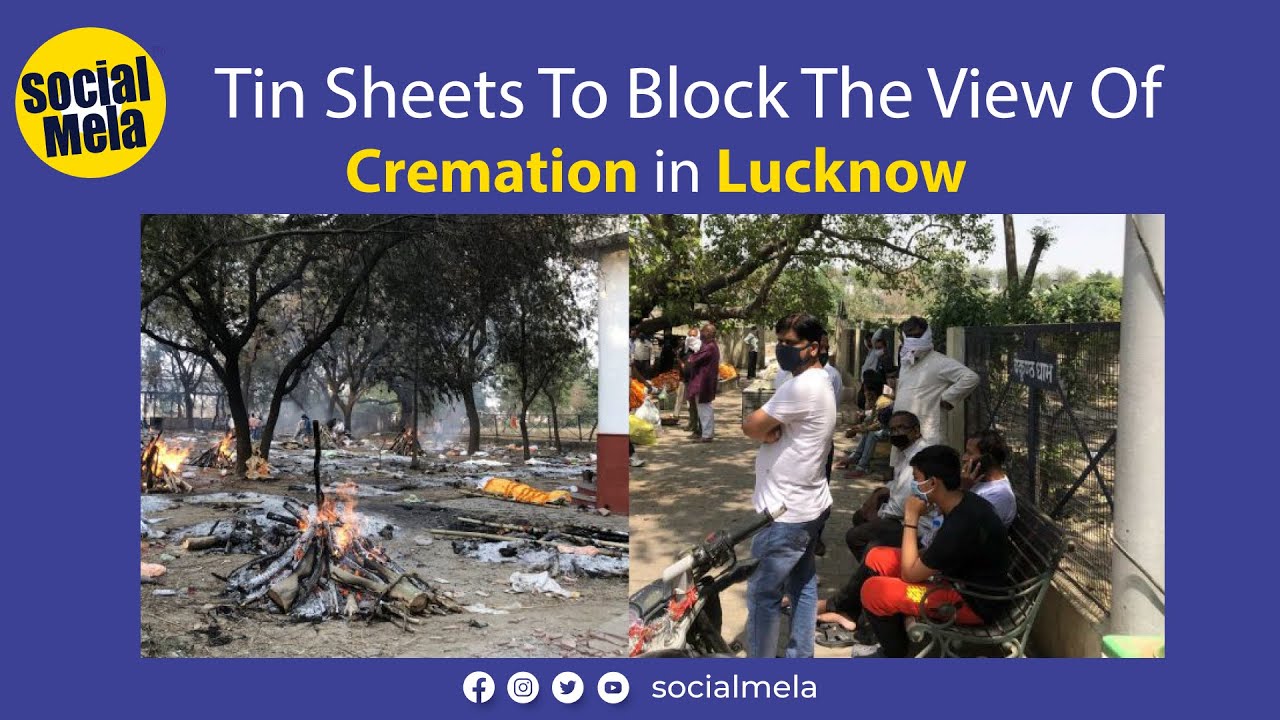 Tin walls set up to block view of cremation site in Lucknow