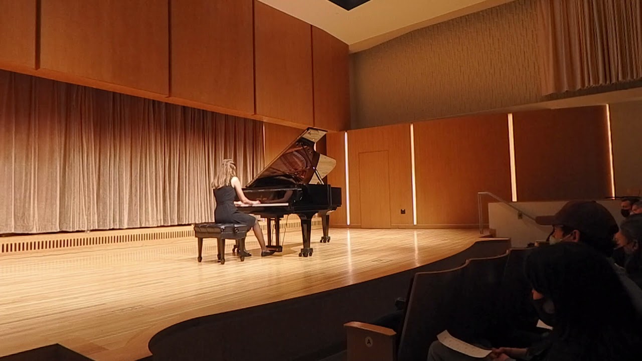 Resurgam by Eric Ball.  Brass band classic played on a Steinway piano by a gifted artist.