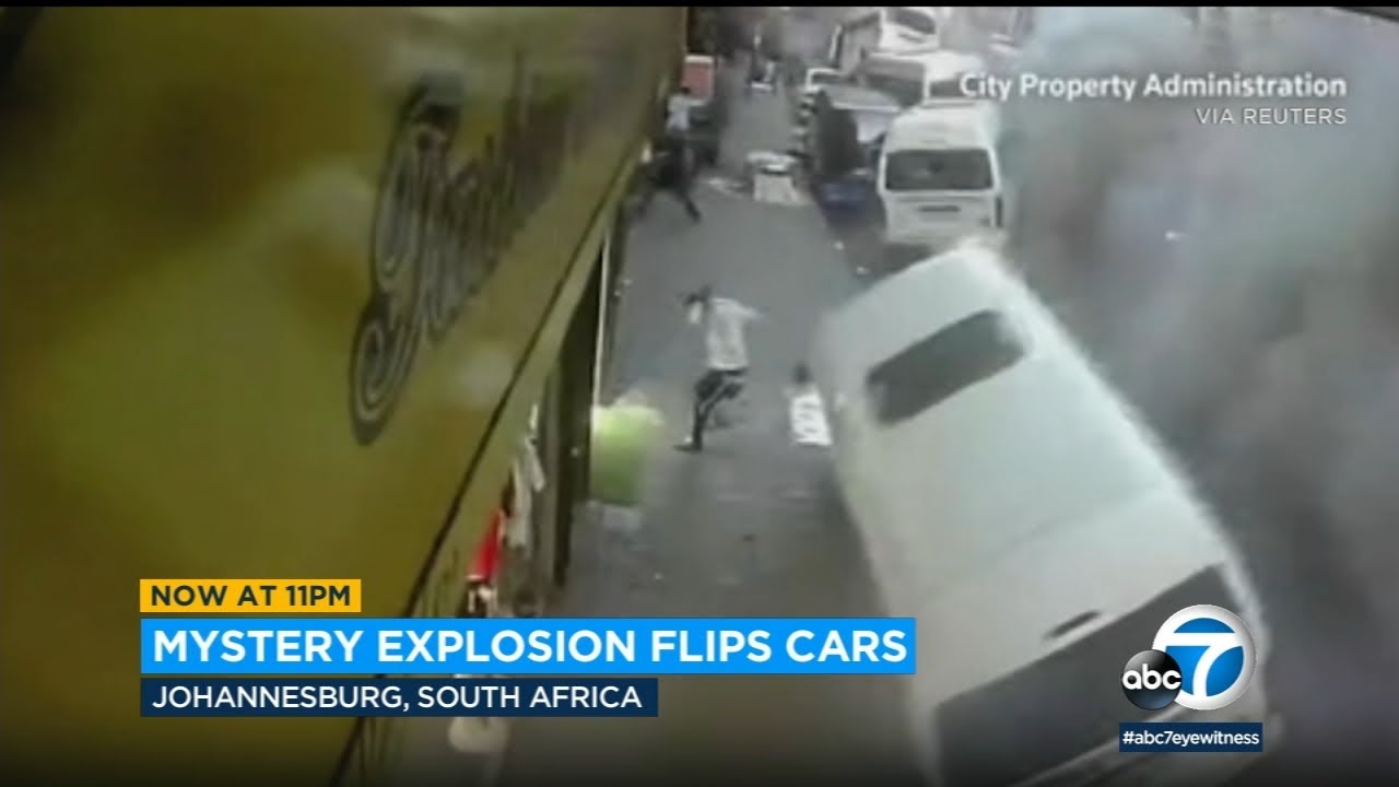 Suspected gas explosion in South Africa rips open roads and flips cars