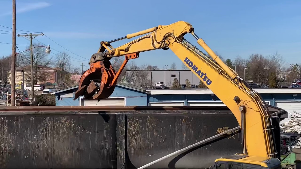 Excavator custom grapple adaptor for loading heavy small materials
