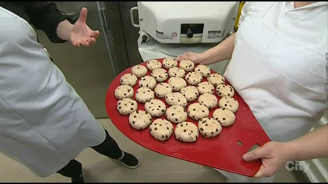 Making hot crossed buns at COBS bakery