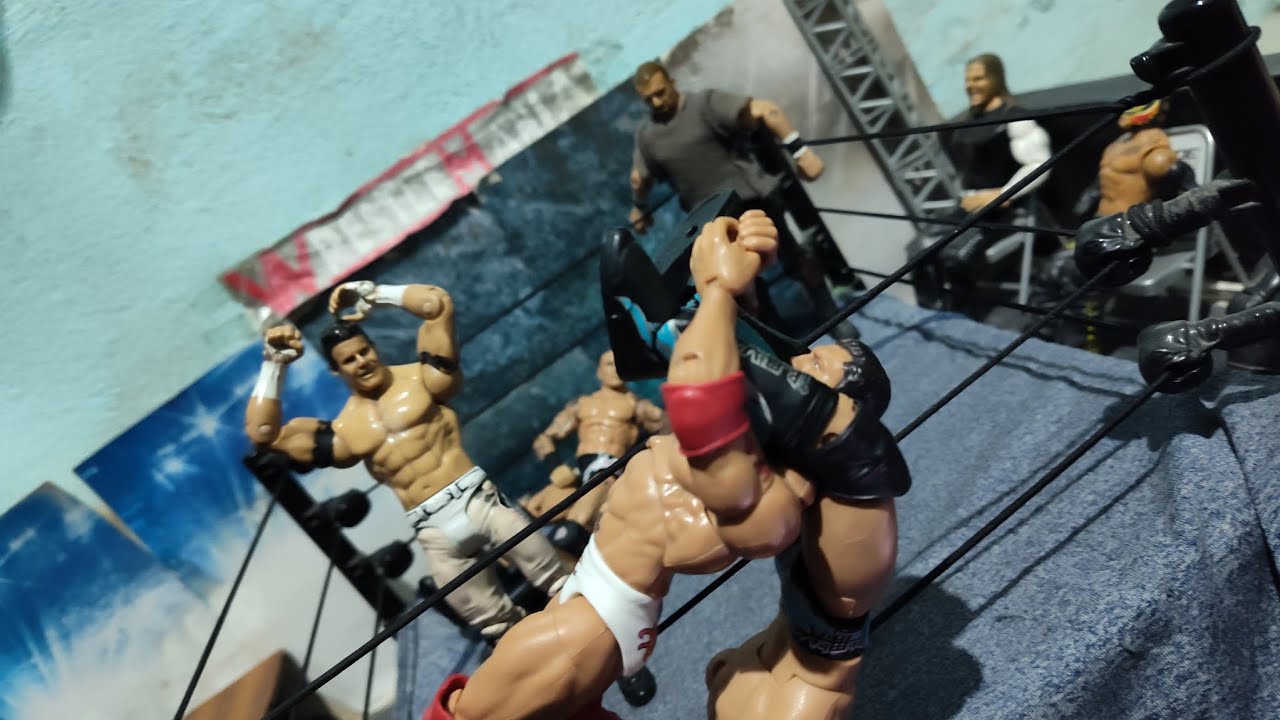 Evan Bourne & Justin Gabriel vs Evolution