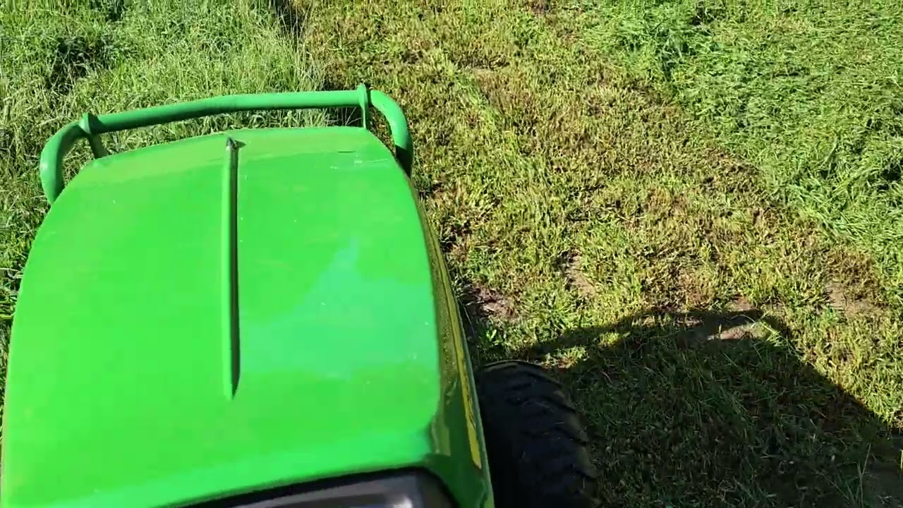 John Deere 1025R Mowing
