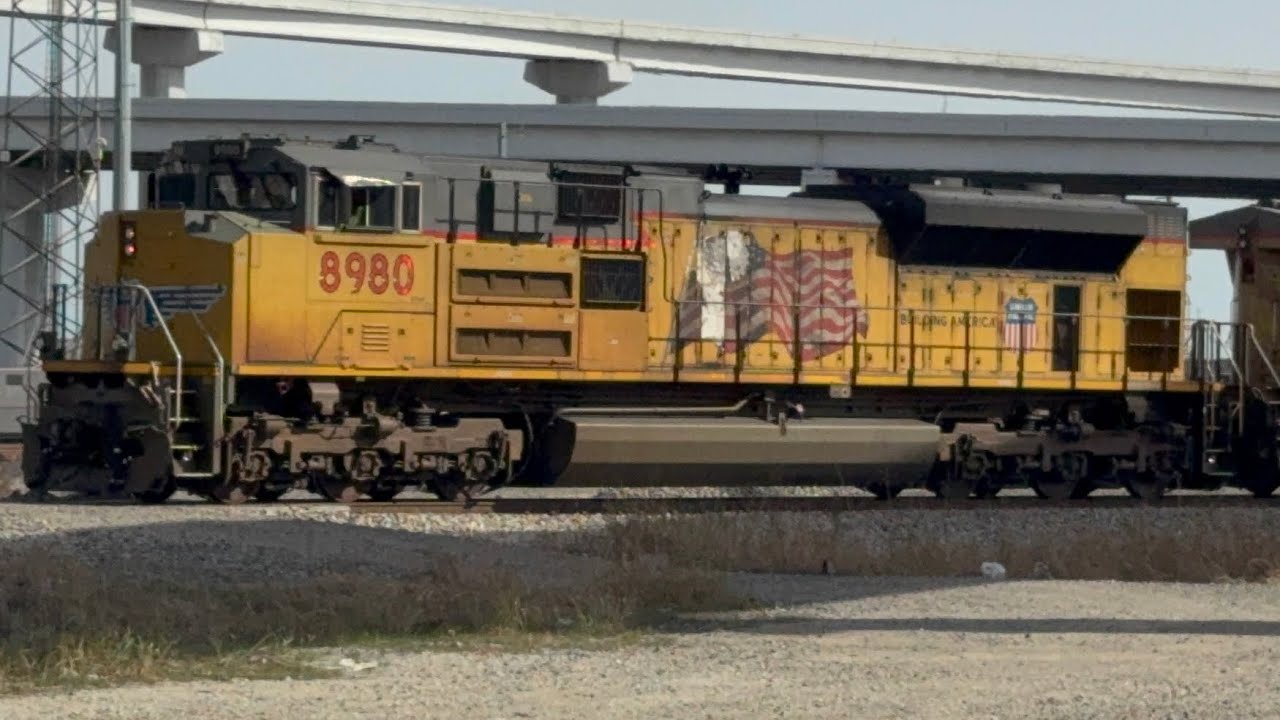 Union Pacific 8980 takes turn at Tower 55 diamonds. Ft Worth TX. Our 1st train of 2026