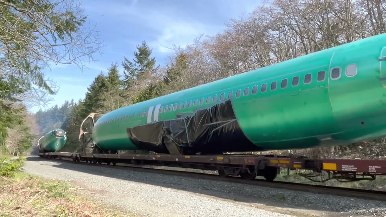 Boeing 737 fuselages get shoved from Mukilteo WA up to the Everett WA plant for final assembly
