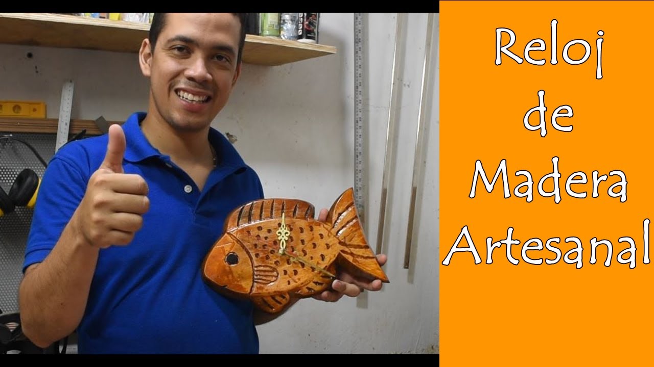 Reloj en Madera artesanal (con forma de pez).