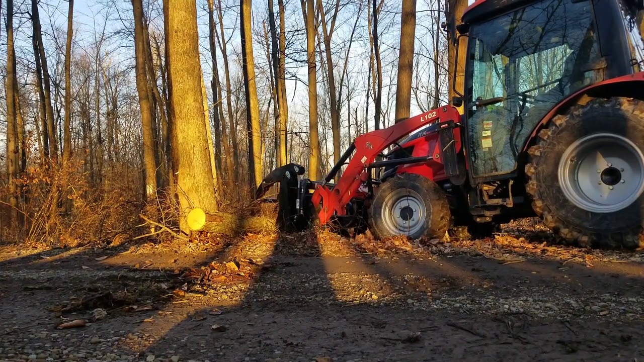 Cleaning Dead Falls In The Forest For Firewood With The RK37 Tractor, Granit Grapple, and Stihl 500i