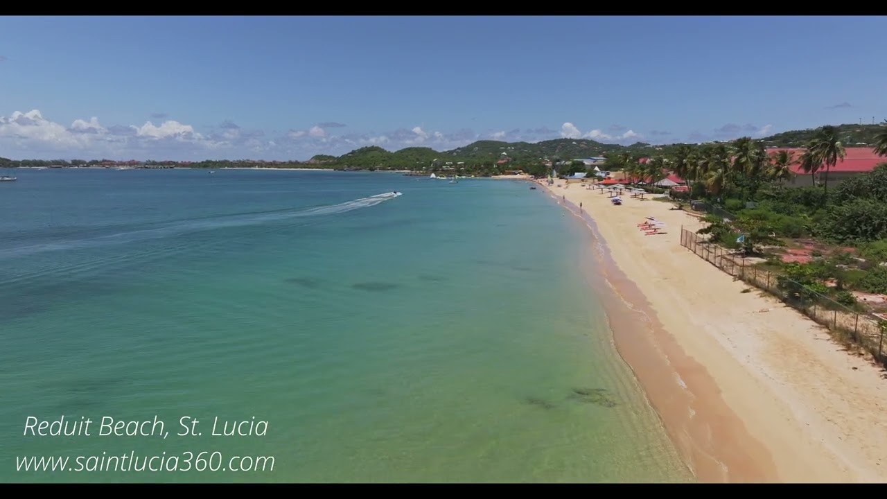 CRYSTAL CLEAR WATERS ON ST. LUCIA'S MOST FAMOUS BEACH, REDUIT BEACH