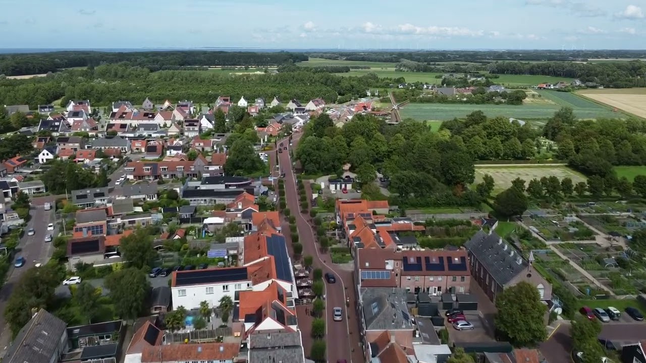 Drone flight over Oostkapelle Windmill, Church and Camping in de Bongerd