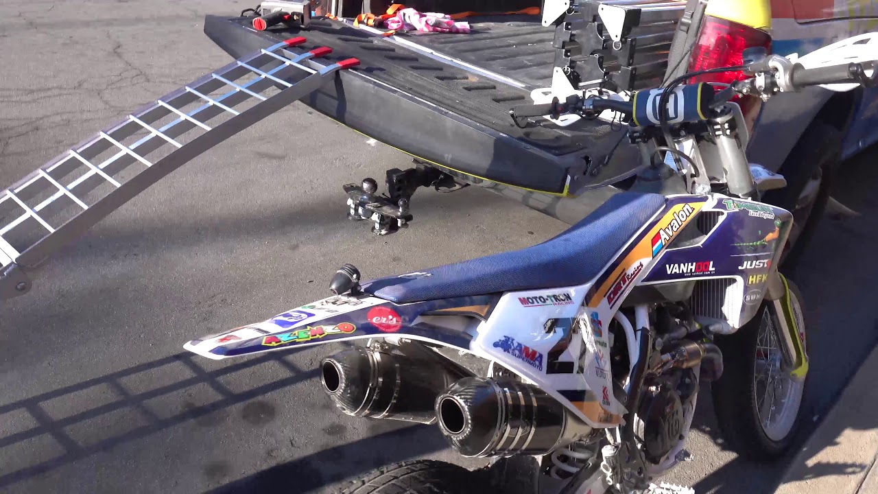 Luna Modded Sur Ron MX vs 450cc Husqvarna Race Bike