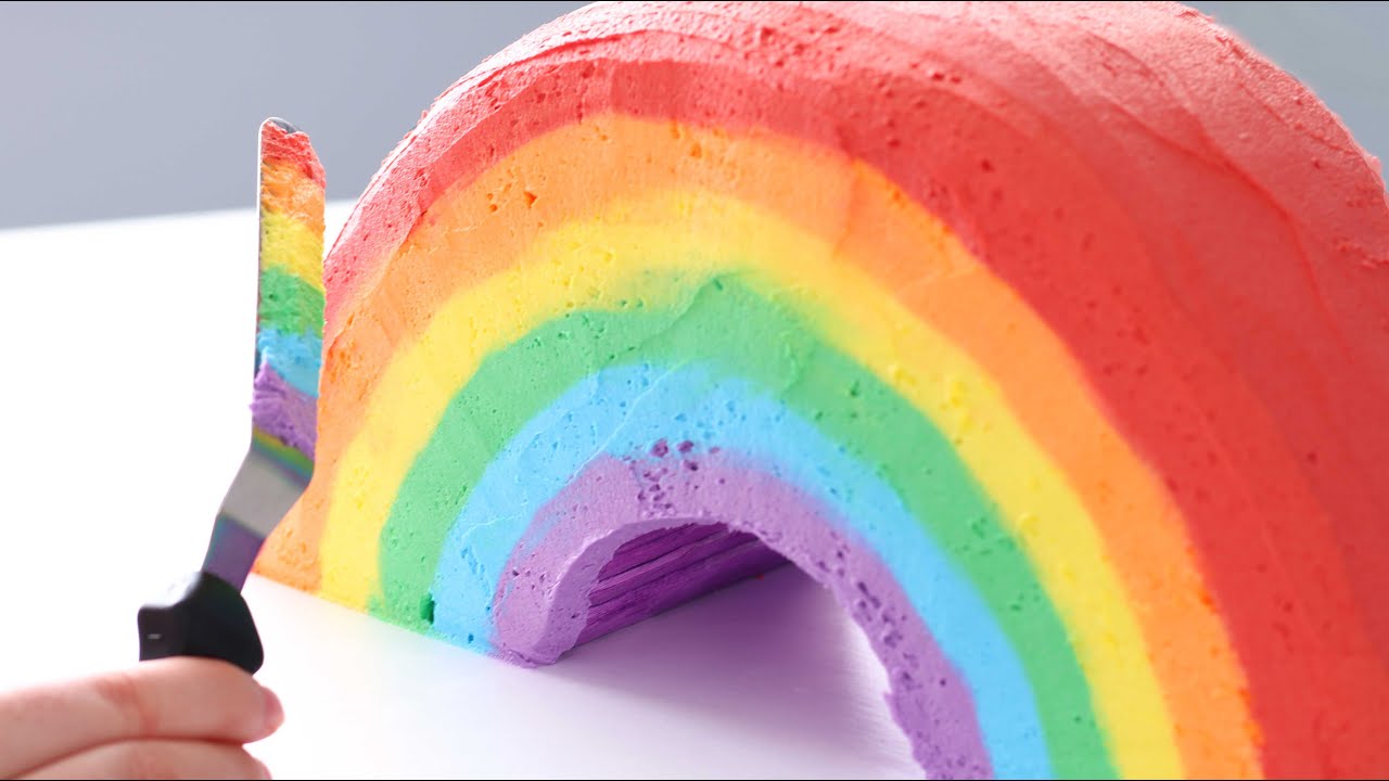 You Won't BELIEVE whats INSIDE this Rainbow CAKE!