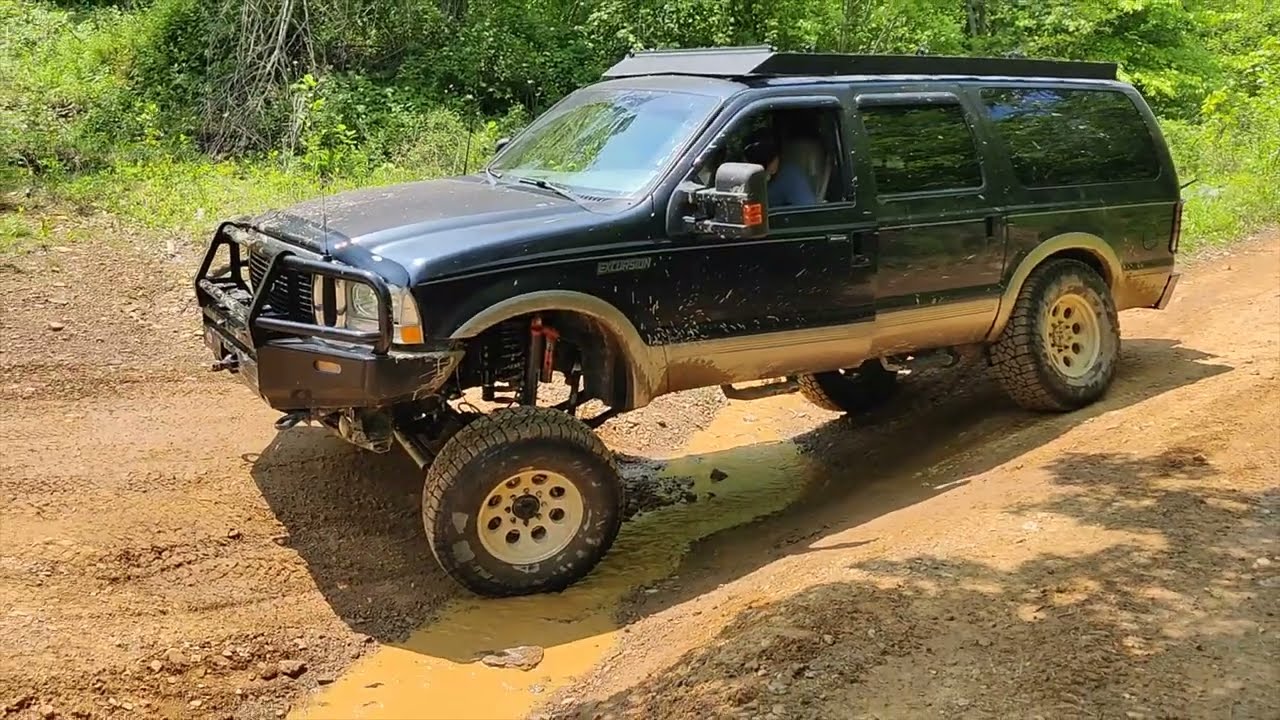 Ford Excursion + Raptor Shocks + Super Duty Axles