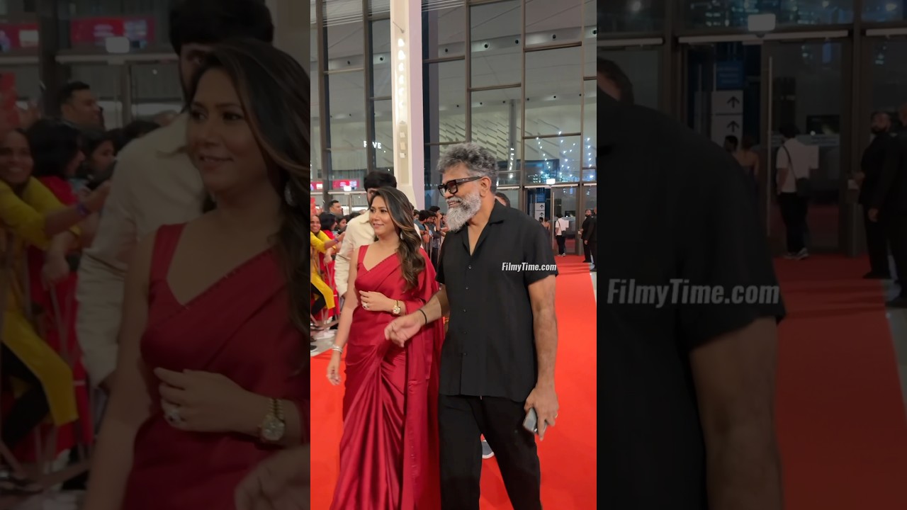 Director Sukumar with wife Thabitha Bandreddi grace the red carpet of SIIMA Awards 2025 | FilmyTime