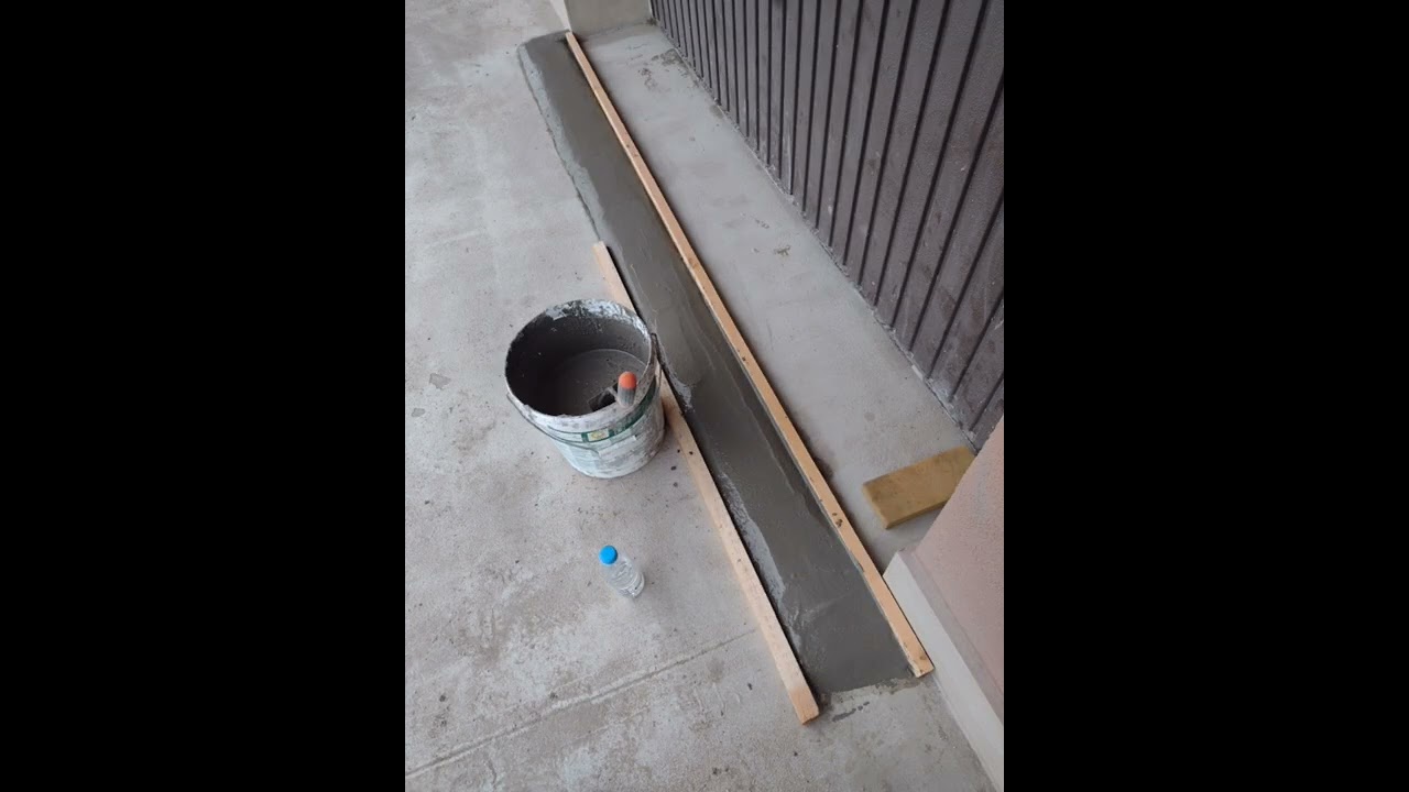 how to stop flooding  in your garage. using concrete and liquid rubber.
