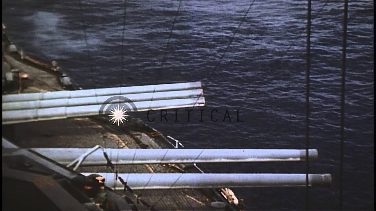 Naval guns fired from US Navy battleship USS Nevada at the coast of Iwo Jima duri...HD Stock Footage