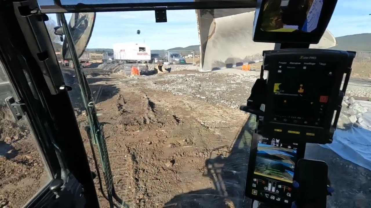 Caterpillar 335 exavator working in norway  Laying out blasted stone