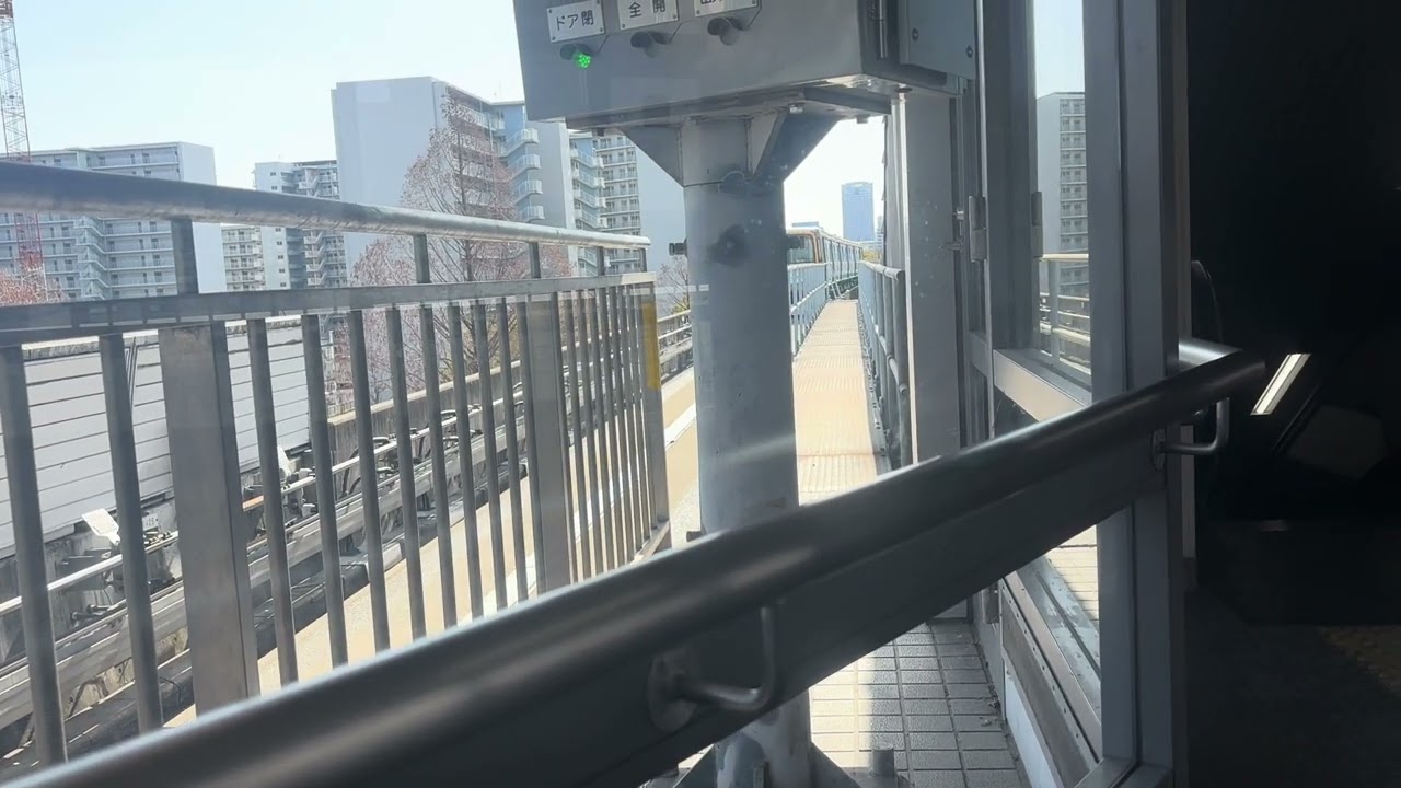 2026.1/26本通行きのアストラムライン7039号車温暖化ラッピング牛田駅2番乗り場出発。