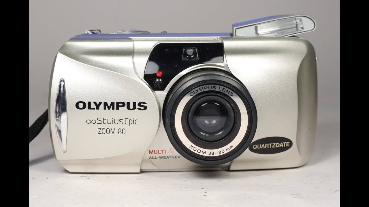 Olympus Infinity Stylus Epic Zoom 80 35mm film camera being tested and demonstrated