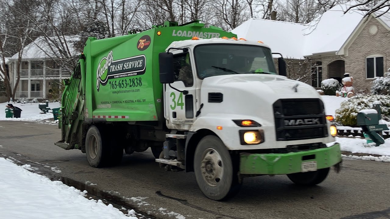 Jacks Trash Service Mack Loadmaster Rear Loader in the Snow