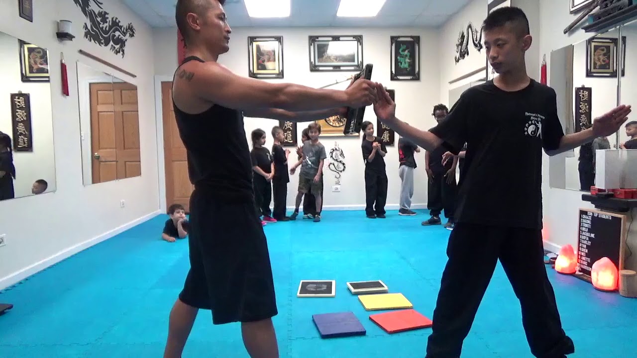 Board Breaking for Kids in Martial Arts Training