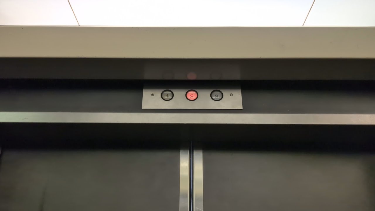 A Ride on the Northern Elevator at J-Town (Professional Complex Building)