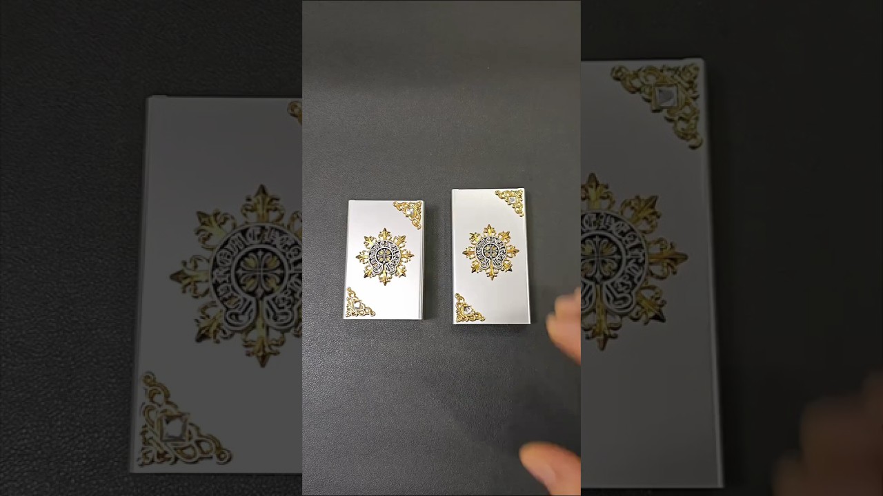 Slide down to open the lid of the metal cigarette case