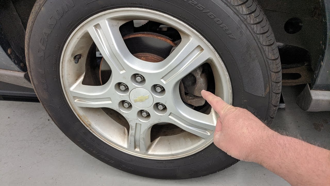 2006 Chevy Uplander right rear wheel banging noise caused by missing brake caliper pin bushings