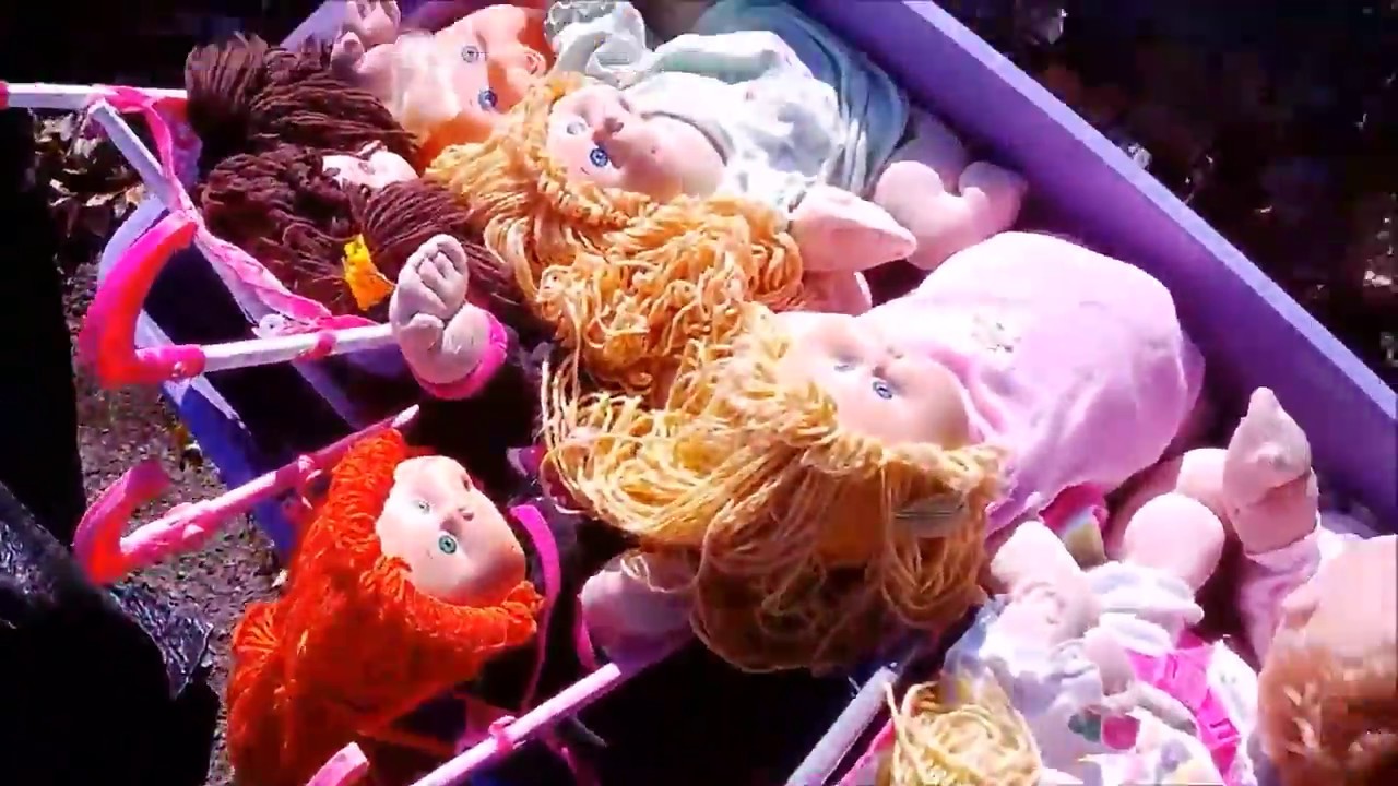 Cabbage patch kids and toys end up in the garbage truck by mistake