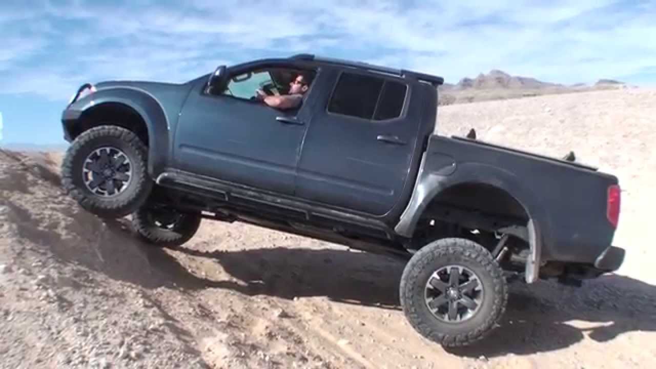 2014 Nissan Frontier Pro-4x, 2003 Frontier 4x2 with ARB locker at Nellis Sand Dunes/Apex