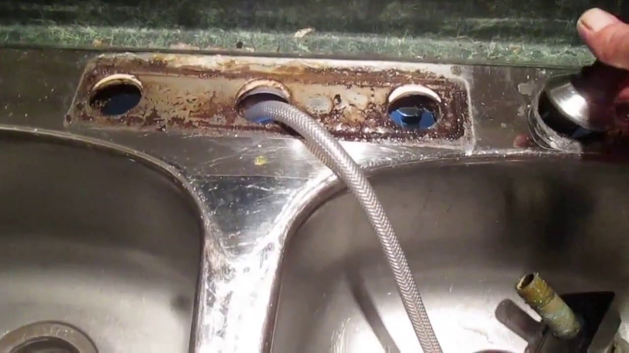 How to replace a kitchen faucet and remove a side sprayer