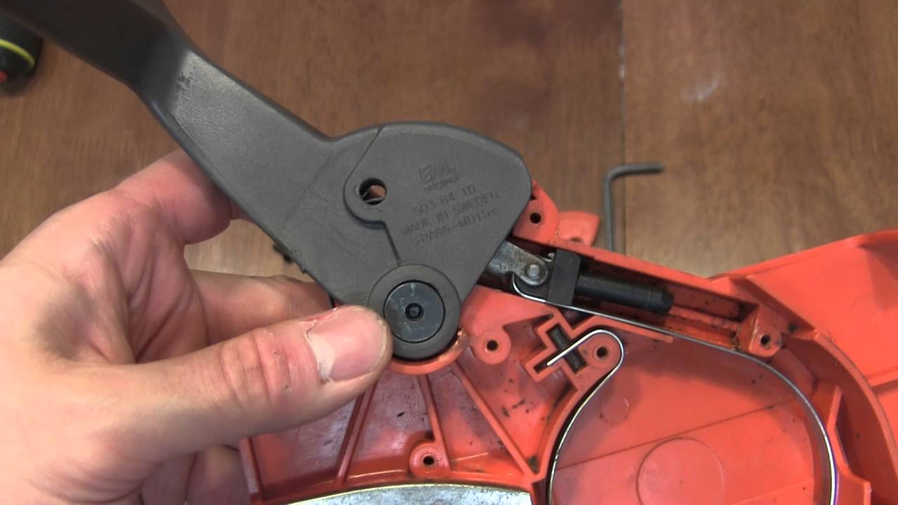 Assembling Husqvarna 55 chain saw chain guard