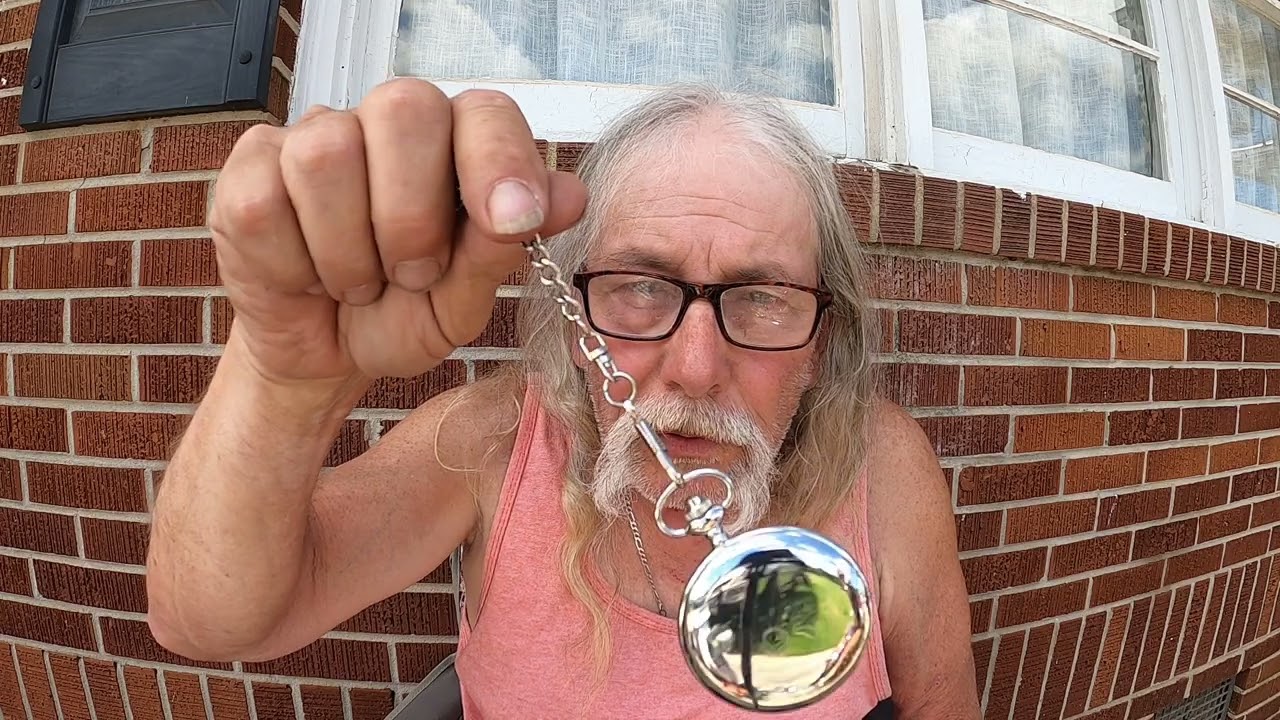 Old Biker Dude practices hypnosis on prospective followers