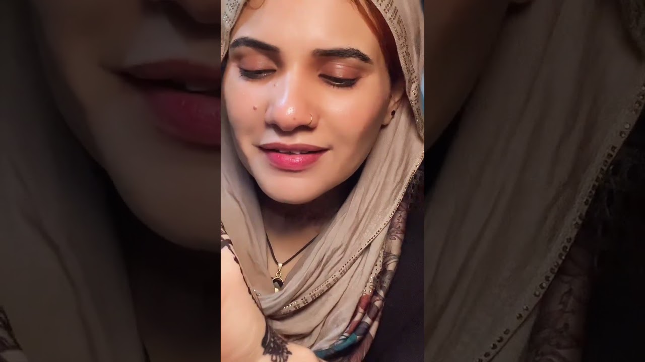 Elegant Woman Showcases Henna Tattoo and Cultural Beauty