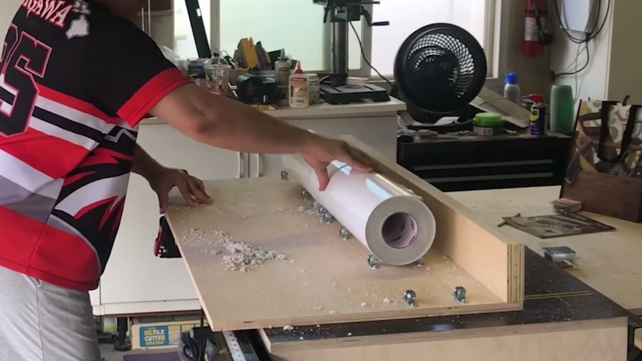 Crosscut sled roller tube configuration to cut vinyl and paper rolls
