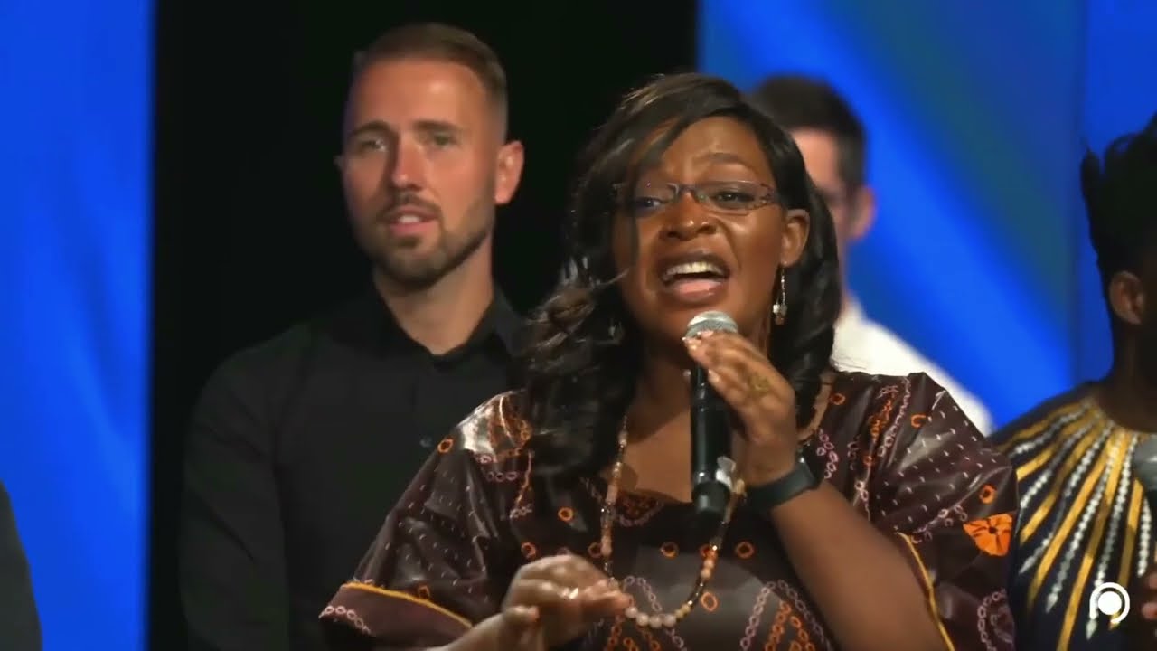 Merci  oh merci (avec la chorale LPG de l'église de la Porte Ouverte)