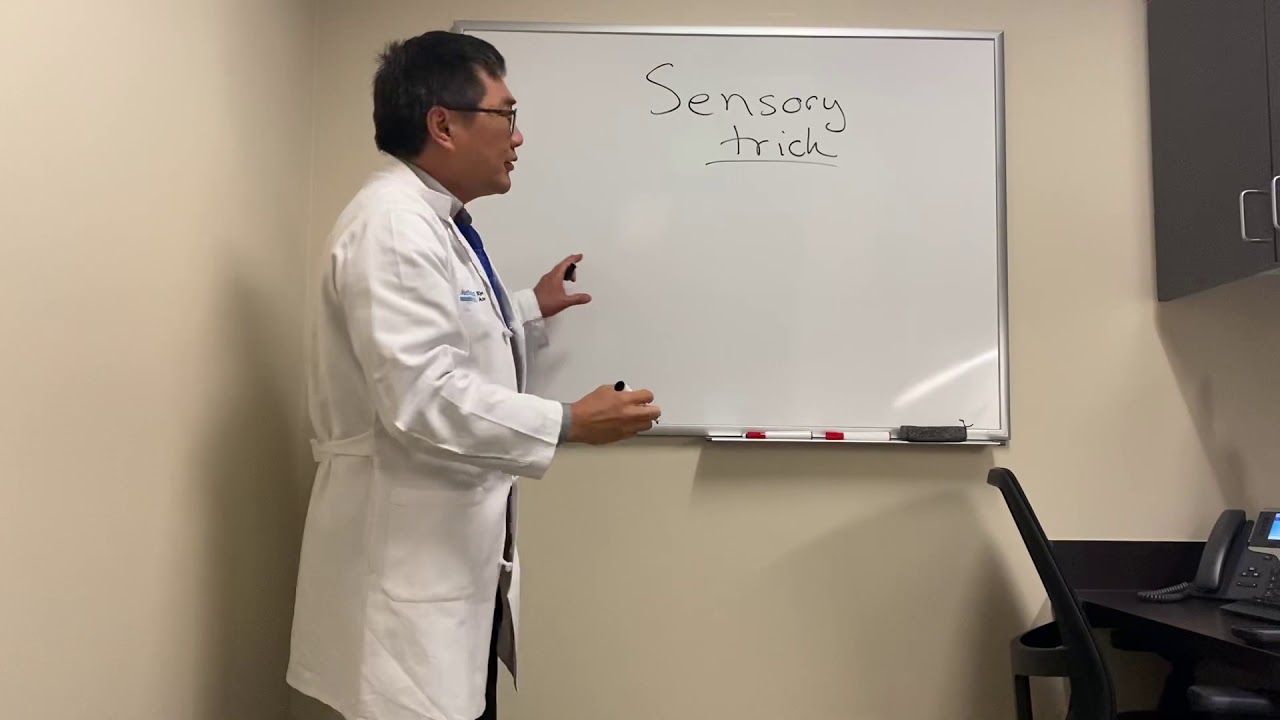 Sensory trick for dystonias