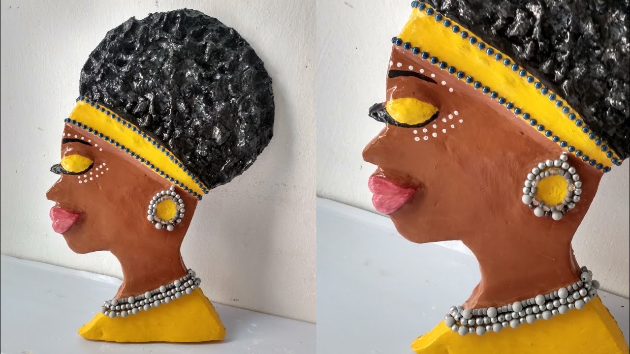 Escultura de Africana  de parede feita com cimento
