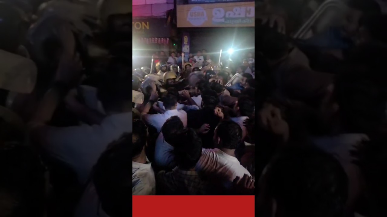 Visual shows Congress M P from Kerala Sri. Shafi Parambil lathi charged by Kerala Police