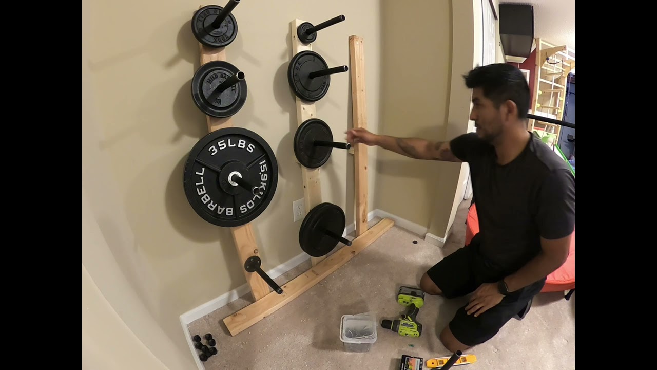 #gym #gymmotivation Weight plate holder: Barbell holder: Wall mounted angled rack DIY