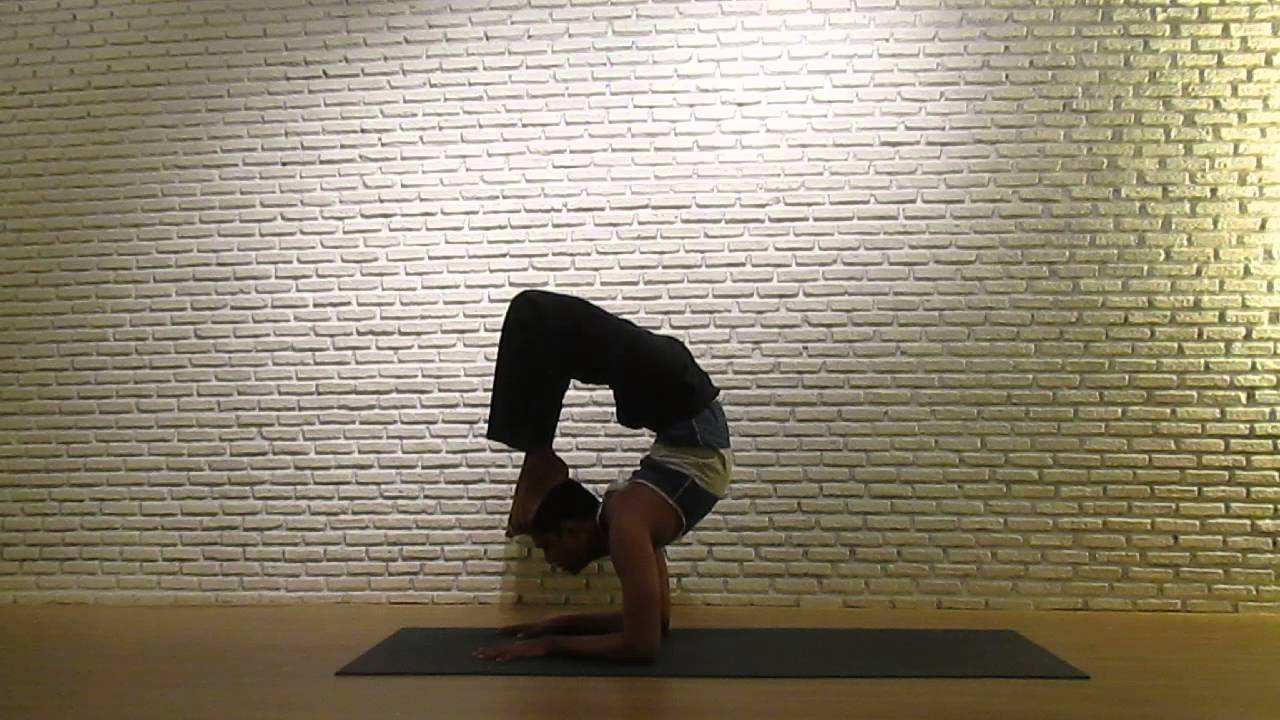 Transition Headstand to Scorpion by master Suresh at Yoga 101 Bangkok