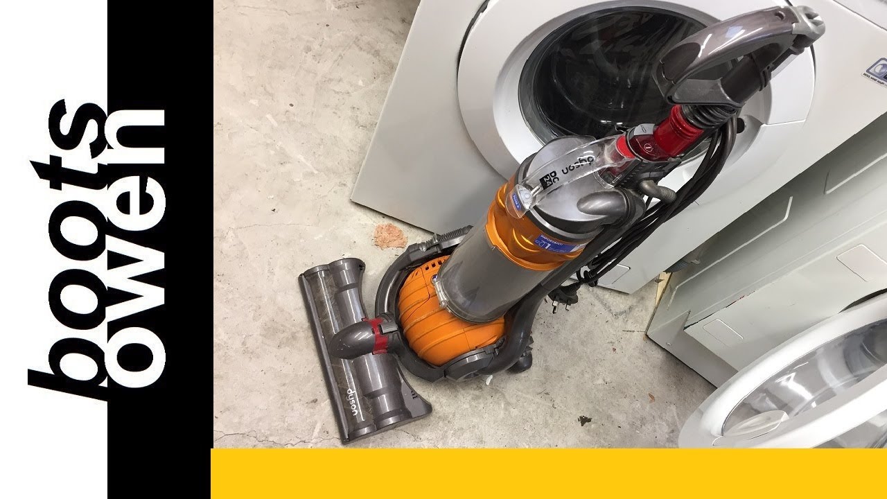 Dyson DC24: how to remove the brush sweeper head and clean it.